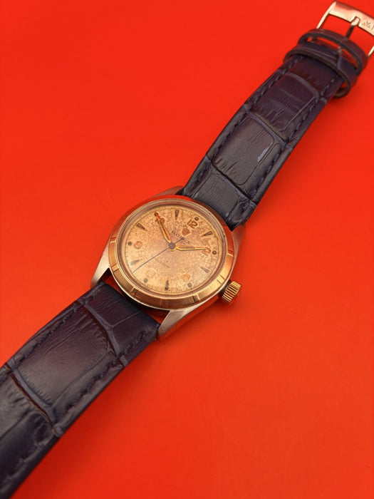 Rolex Bubbleback circa 1947 manual wind steel w/ rose gold 30mm