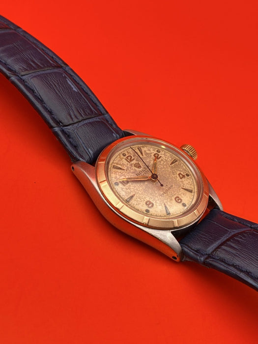 Rolex Bubbleback circa 1947 manual wind steel w/ rose gold 30mm